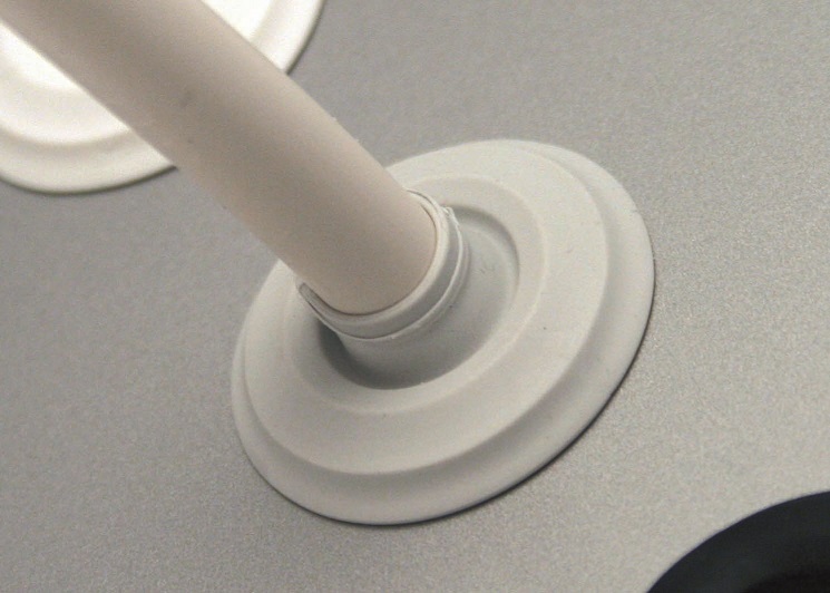 TSS grommet with joy-stick function and push-out membrane.